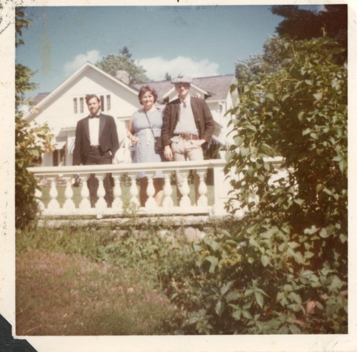 Download the full-sized image of Photograph of Rupert Raj in a Tuxedo Standing with Two Others