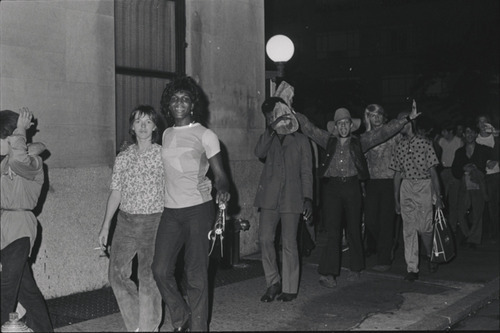 Download the full-sized image of Photograph of Marsha P. Johnson Walking Arm in Arm with Another Protester