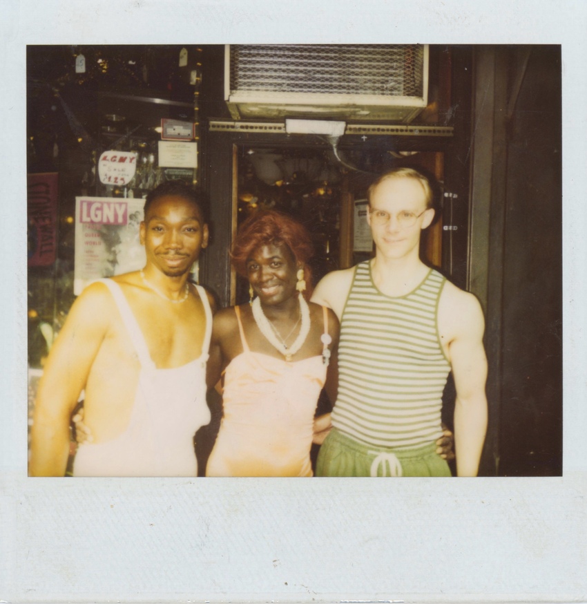 Download the full-sized image of A Photograph of Cocoa Rodriguez Posing with Two Friends