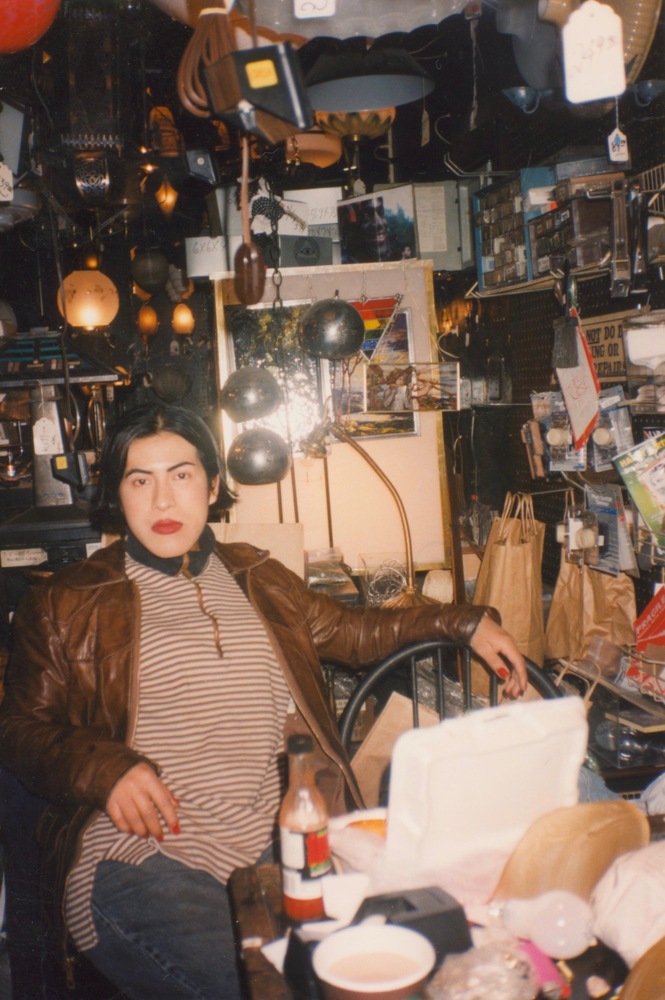 Download the full-sized image of A Photograph of Melissa Seated at a Table