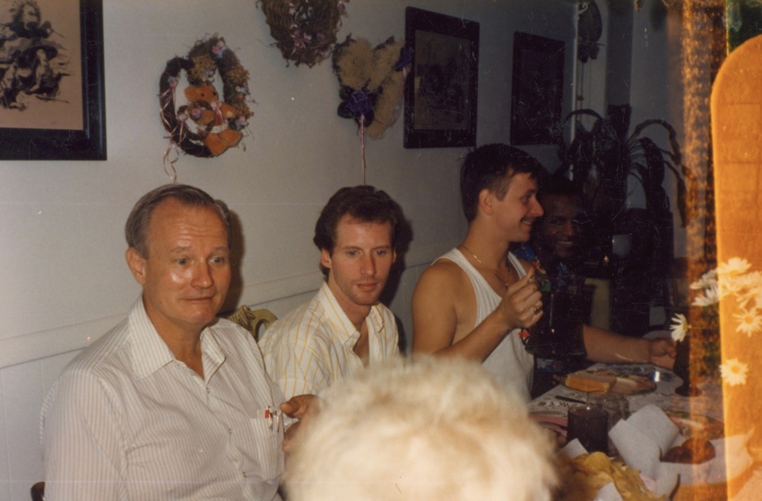 Download the full-sized image of A Photograph of Marsha P. Johnson Sitting at a Table with Randy Wicker, George Flimlin, and Willie Brashears