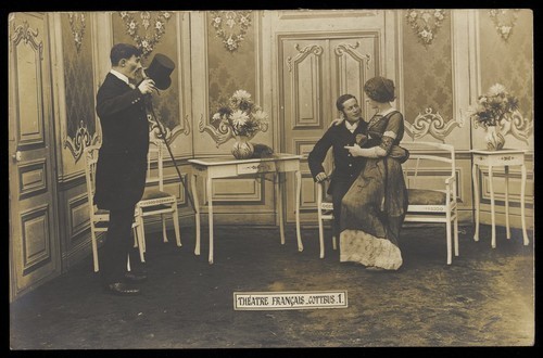 Download the full-sized image of French prisoners of war, one in drag, performing a show at a prisoner of war camp in Cottbus, with an elaborate stage set. Photographic postcard, 191-.